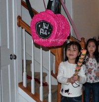 pink and black pinata